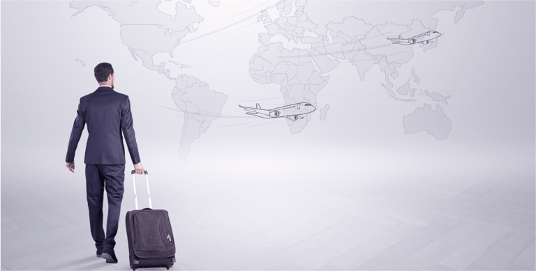 Businessman in dark suit planning his trip in a front of a map