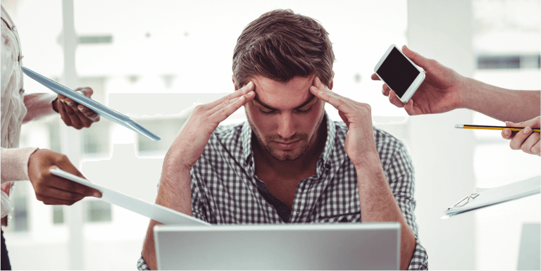 Businessman stressed out at work in casual office