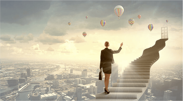 Businesswoman walking up staircase to door in sky
