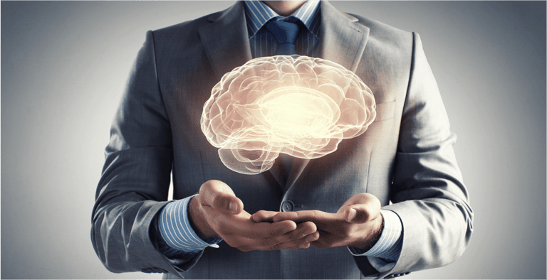 Close up of businessman holding digital image of brain in palm