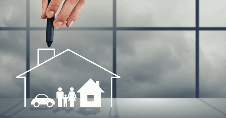 Close up of human hand drawing happy family and real estate concept